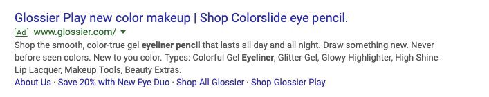 glossier text ad